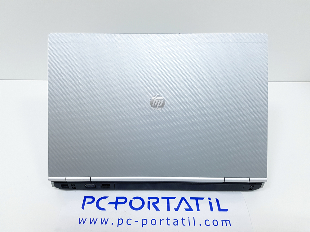 hp 8470p vinilo carbono abierto trasera